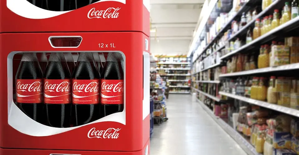 WAVE multi-cycle crate with 12 Coca-Cola 1L bottles displayed at a supermarket shelf