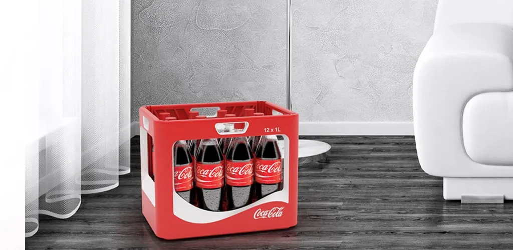 WAVE Coca-Cola multi-cycle crate placed on a wooden floor in a modern living room