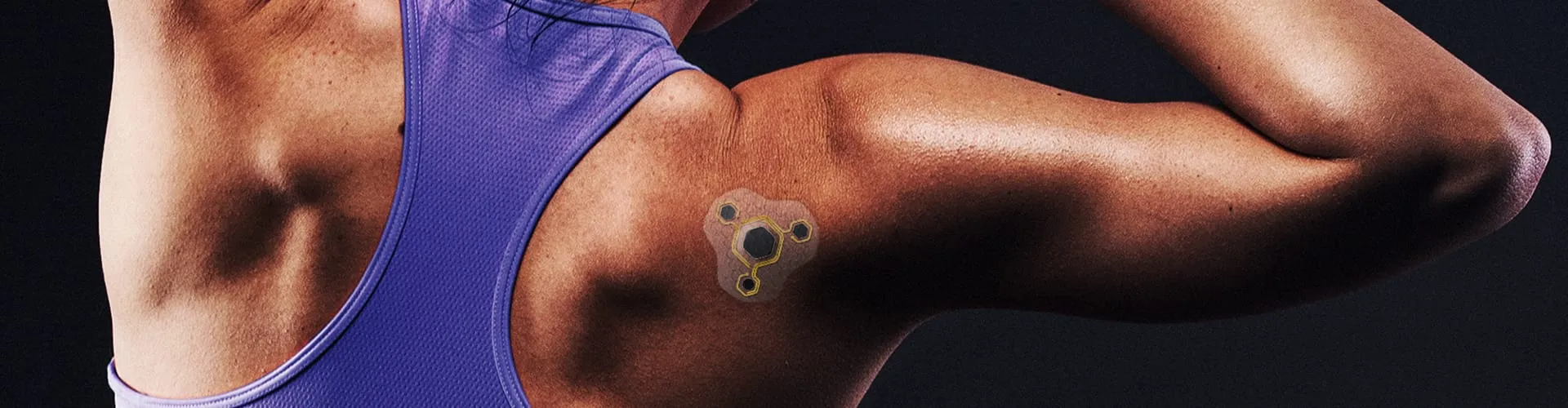 Covestro Patch 3D-printed wearable on athlete's upper back and shoulder, wide dark banner