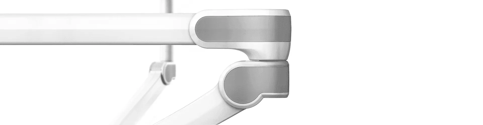 VALIA medical design close-up: Ondal pendant arm joint with polished aluminium end cap on white