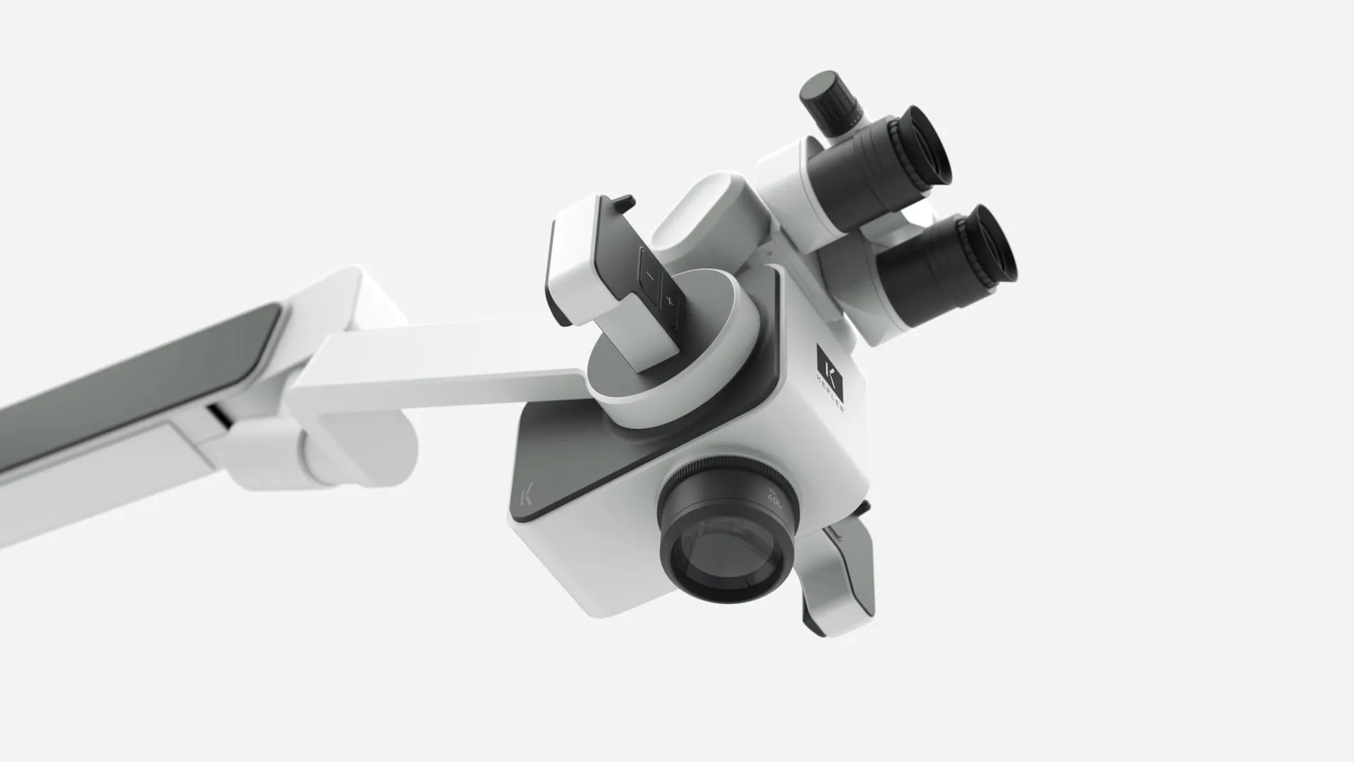 KEPLER dental microscope optic head from below, showing dual eyepieces, objective lens, and articulated arm