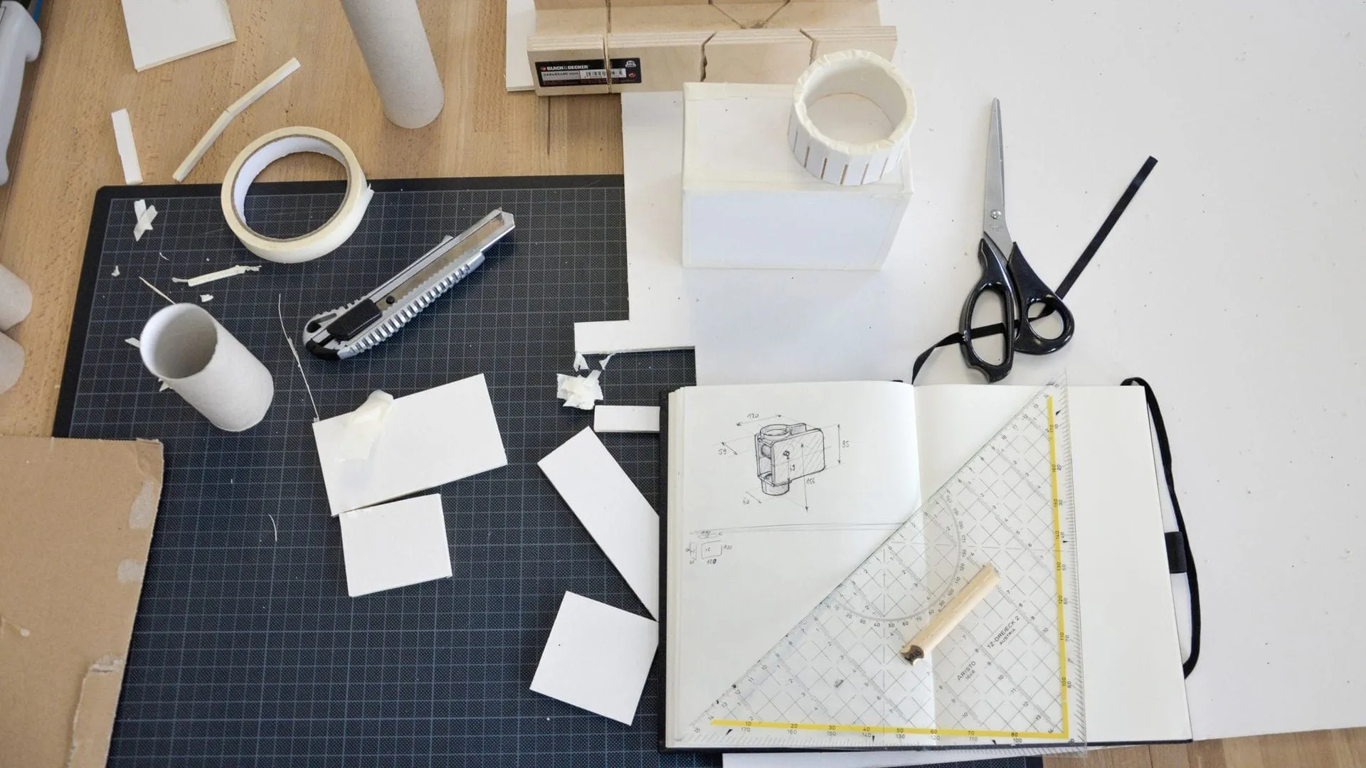 Design studio workspace with ad-hoc models used for ergonomic testing of the KEPLER dental microscope